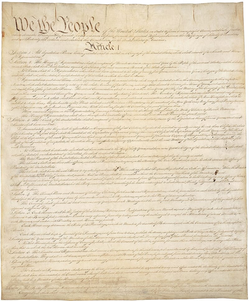 The first page of the original engrossed Constitution, beginning “We the People”
