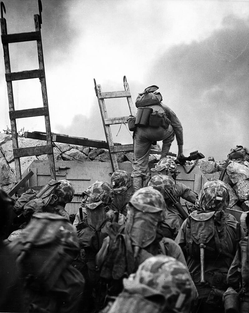 U.S. Marines climbing a seawall during the Inchon landing