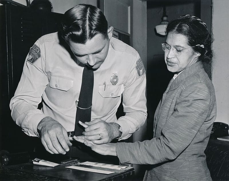 Rosa Parks being fingerprinted after her arrest during the Montgomery bus boycott