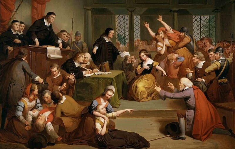 T. H. Matteson’s 1855 painting of the 1692 witchcraft trial of George Jacobs in Salem, with an accuser pointing at the old man